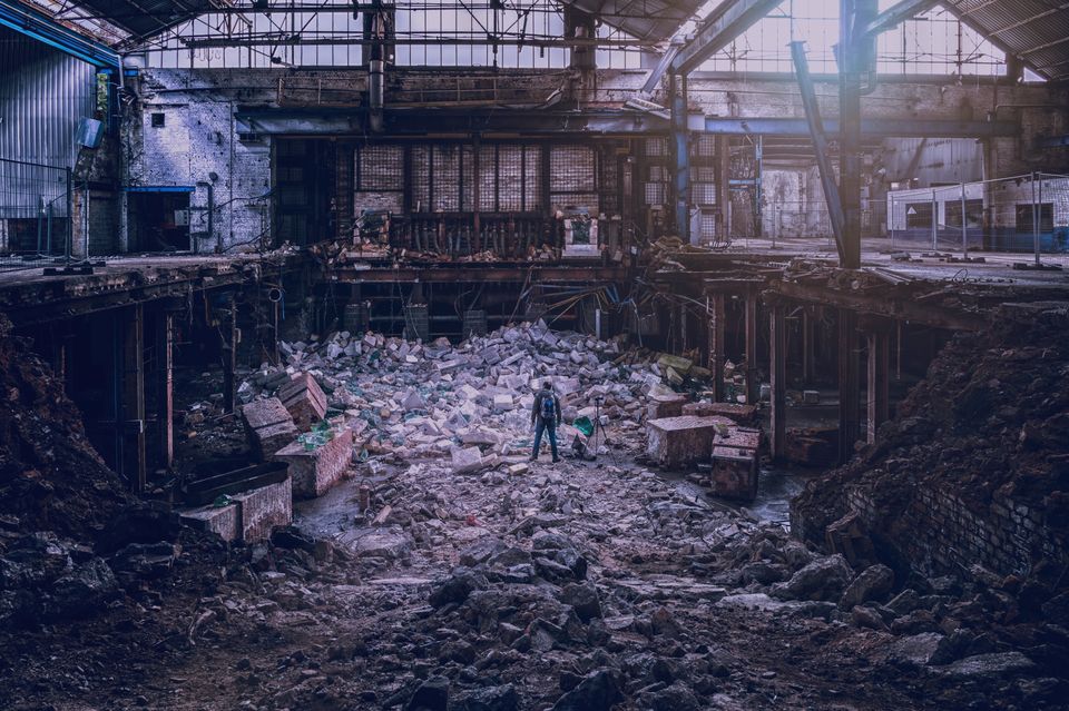 Man in demolished building